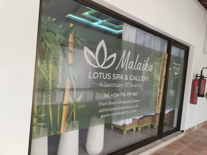 Exterior signage for Malaika Lotus Spa and Gallery